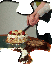 Still cutting cake